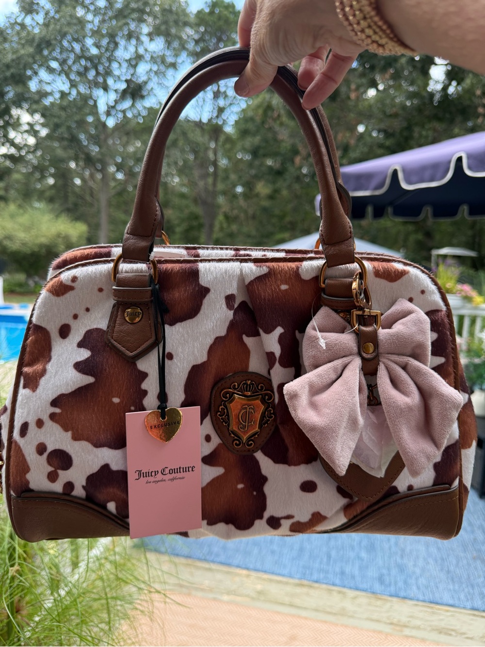 Juicy Couture Brown & White Cow Print Satchel with Pink Bow Charm